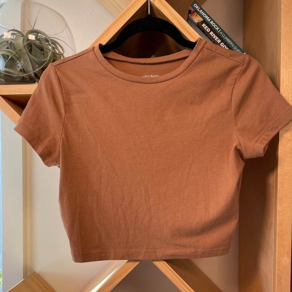 Tan crop